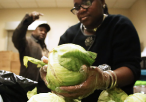 food pantry featured image -- woman with lettuce