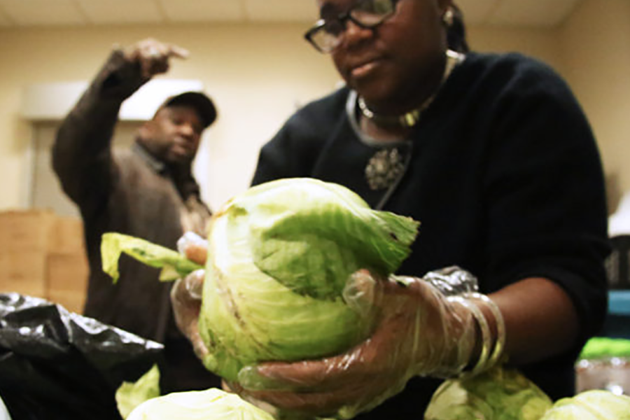 food pantry featured image -- woman with lettuce