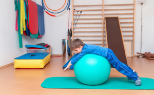 Early childhood outpatient services — child playing on ball