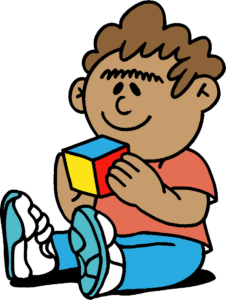 child playing with rubix cube